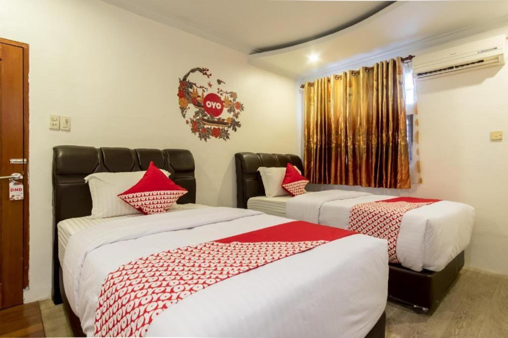 Oyo 619 Naufal Guest House Syariah เมดาน ภายนอก รูปภาพ
